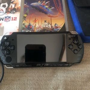 PSP W/ 3 games, car charger and case